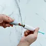 MASSAGEADOR DE GENGIVAS ELTRICO EM SILICONE AZUL - MARCUS & MARCUS